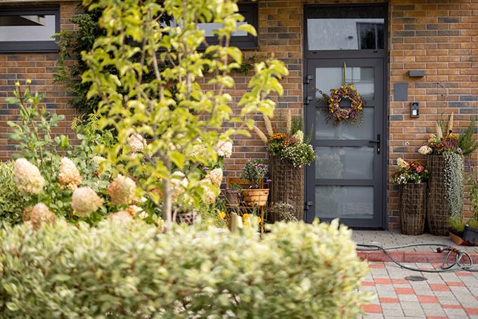 Front door on home property in grey